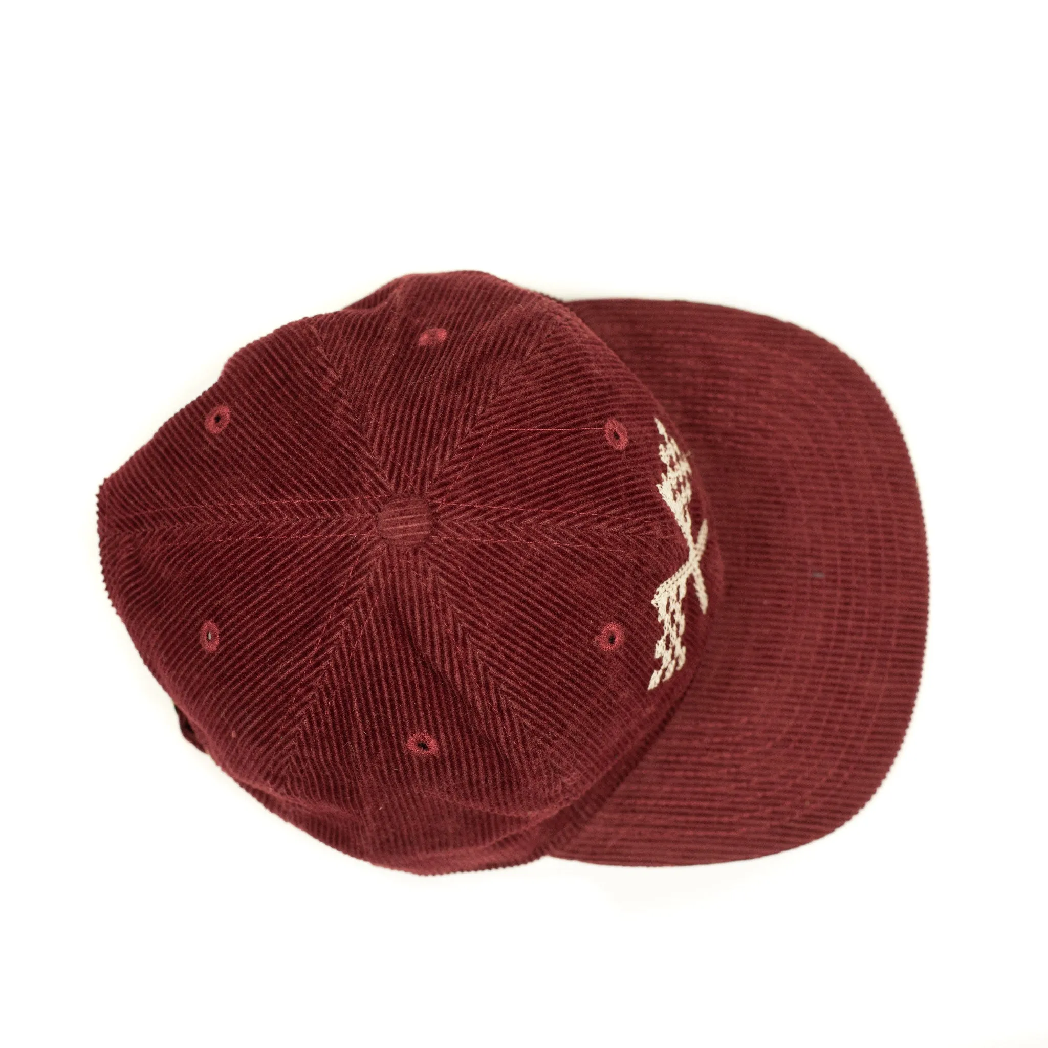 Corduroy cap in crimson with racing flag chainstitched embroidery