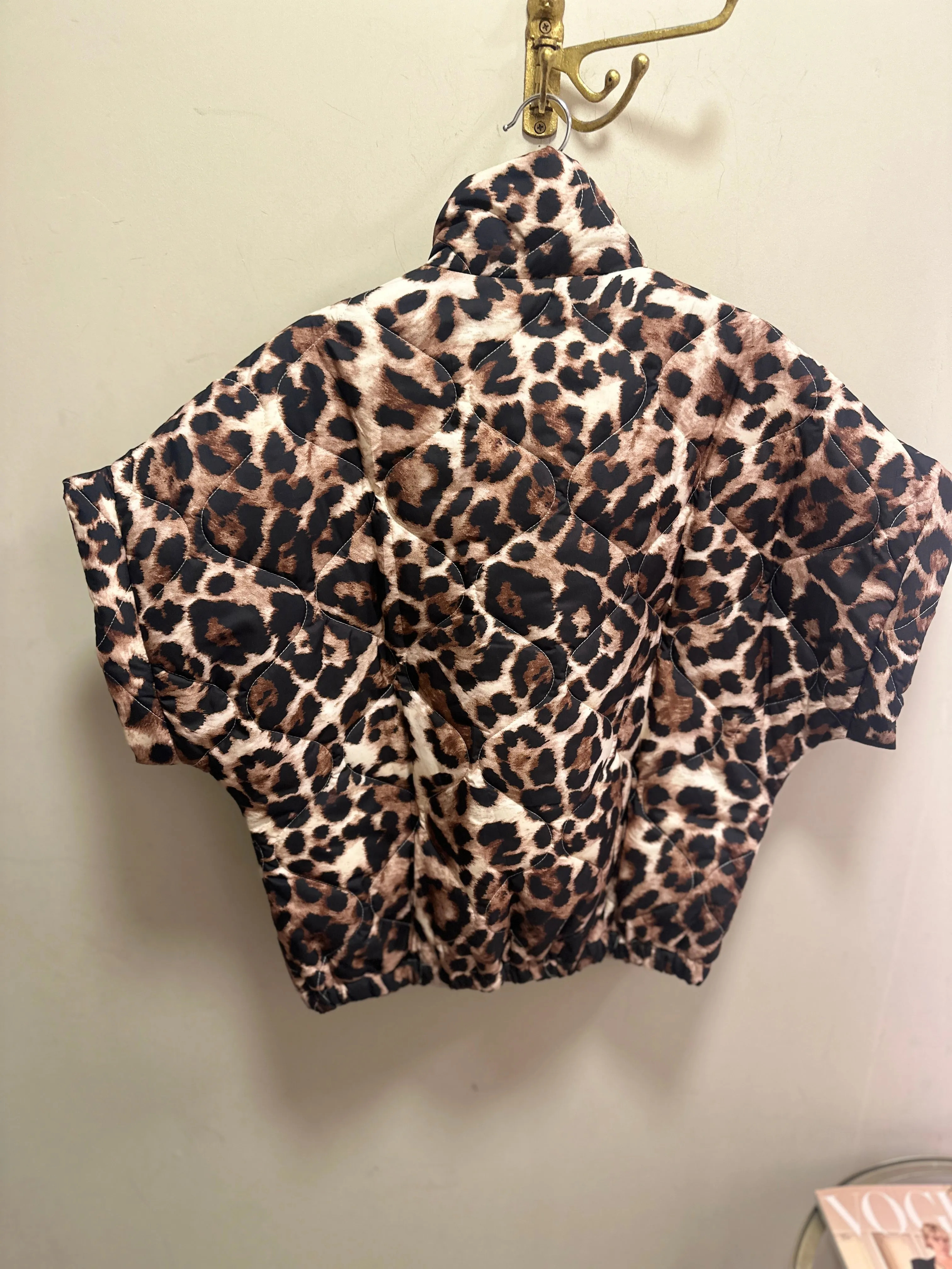 Padded showerproof leopard gilet with orange zip